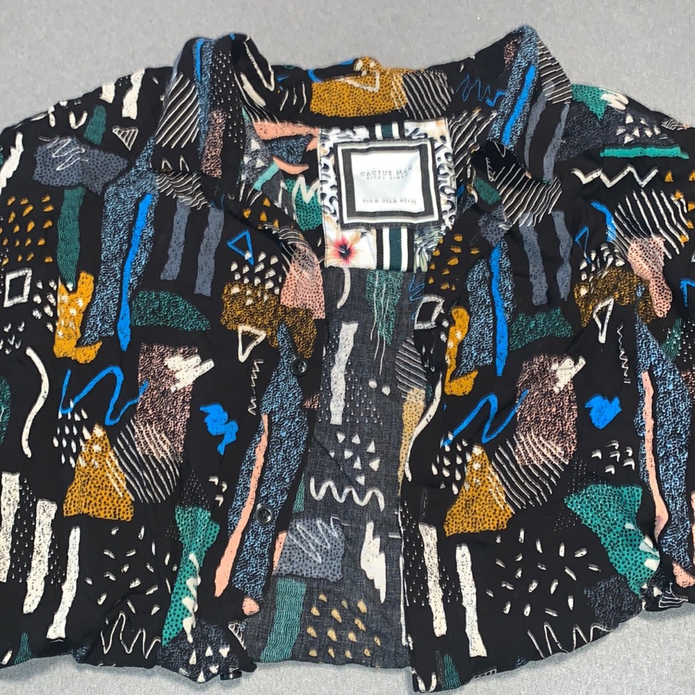 Men’s flared button down shirt